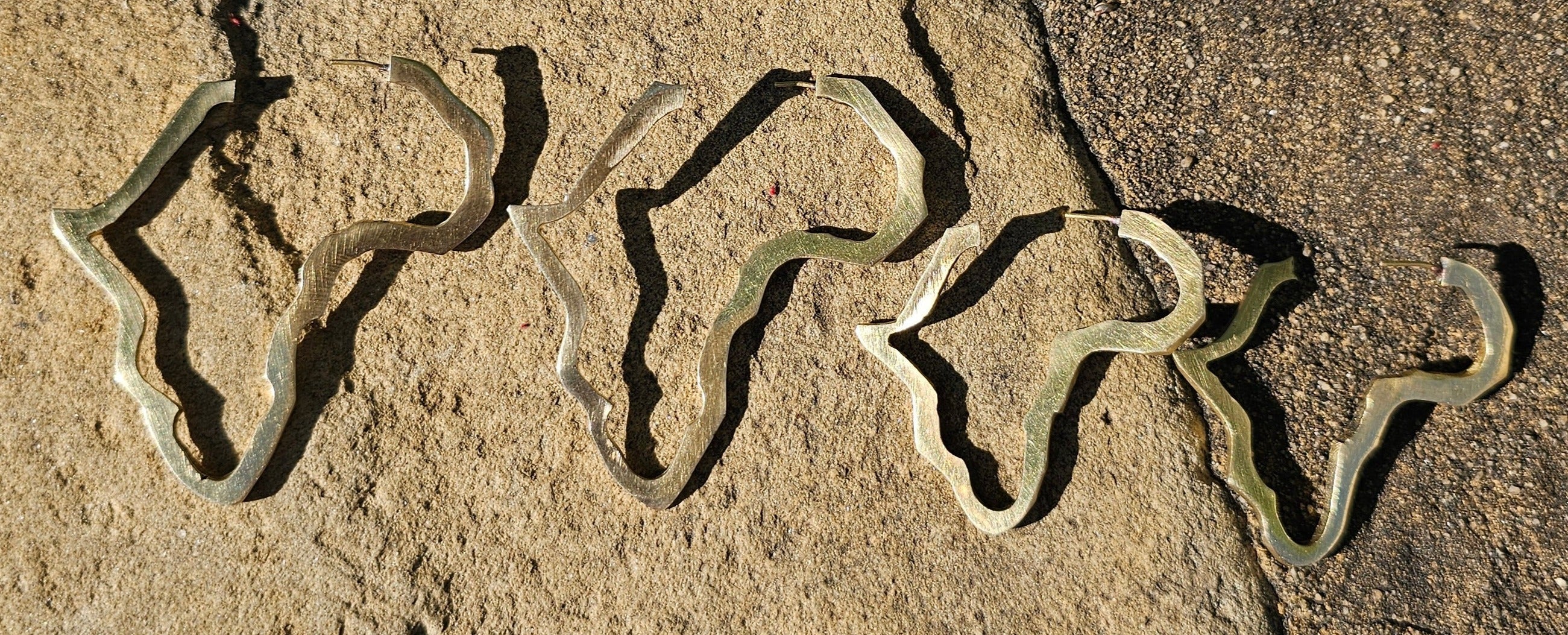 Small Open Motherland Brass Earrings